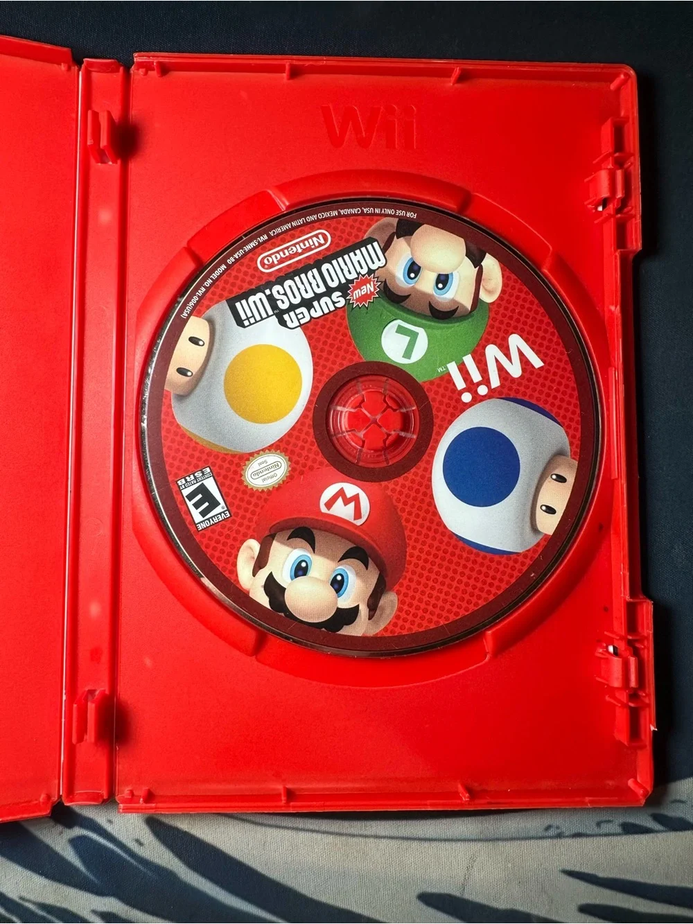 Nintendo New Super Mario Bros. Wii - Red Game Case with Colorful Cover Art